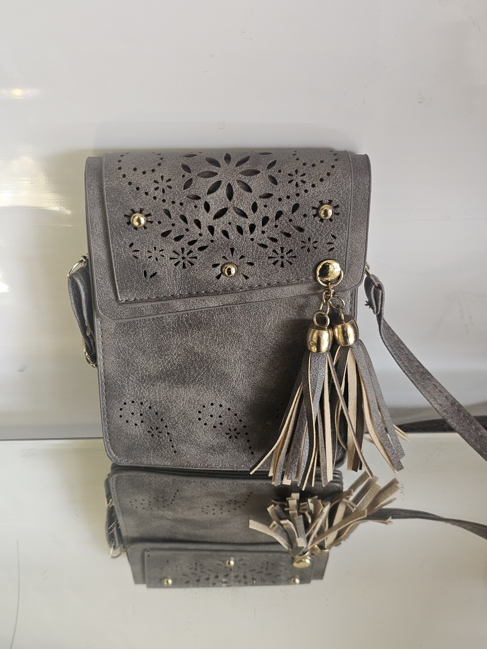 Gray Laser-Cut Tassel Crossbody Bag